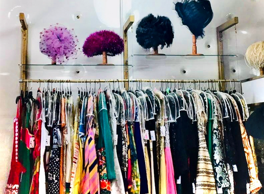 Vintage store colourful patterned clothing racks