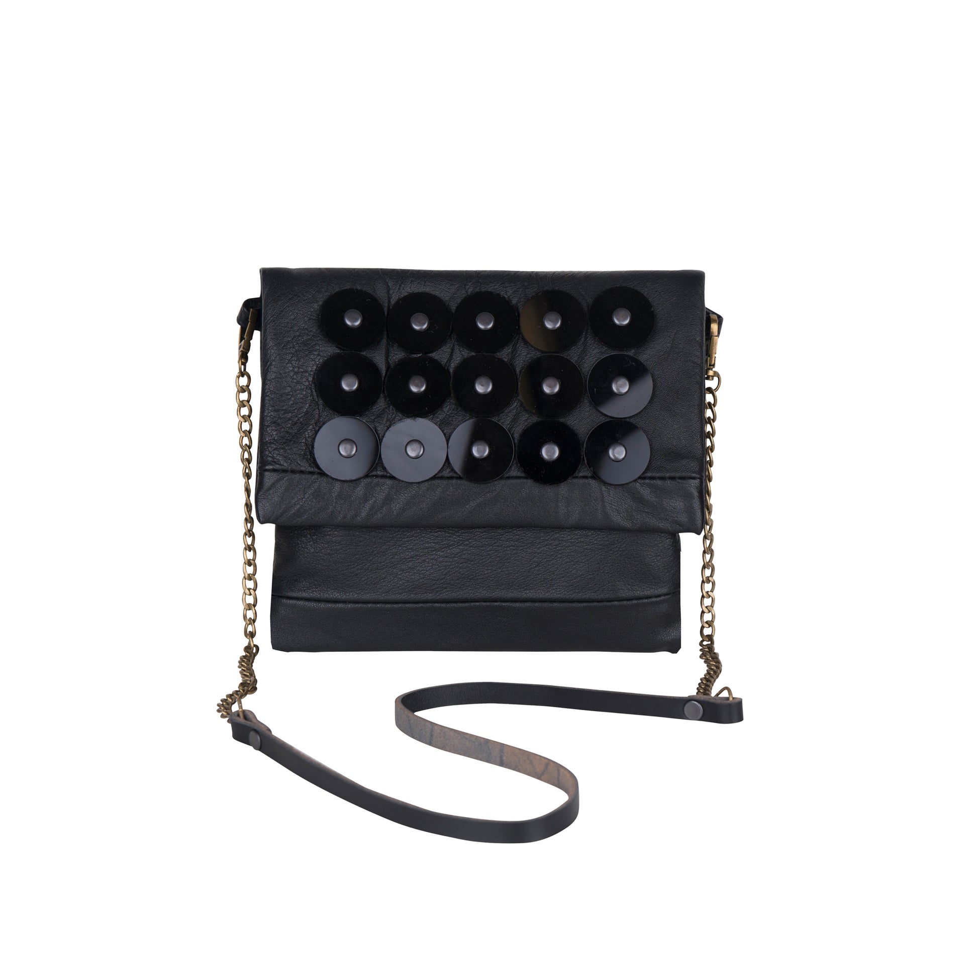 METANoIA black recycled leather small handbag with black circle acrylic forms fashioned into a repeative fashion with a smaller circle overlay on each form.