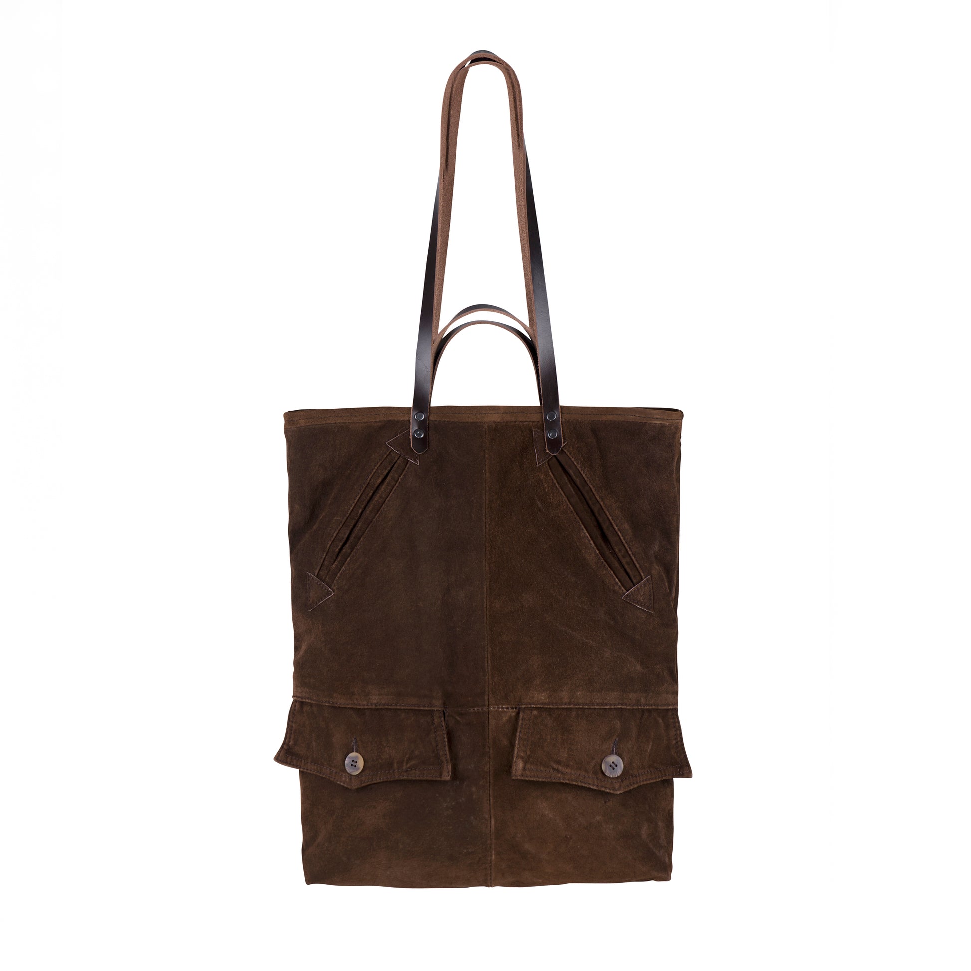 The back of the METANoIA The Cross Bag consisting of recycled leather with an original leather piece wherever possible, every bag has a unique pocket placement.