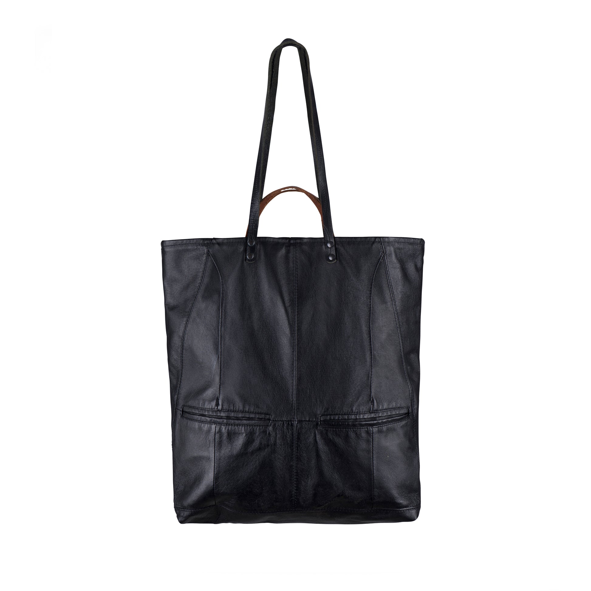 The back of the METANoIA The Iris Bag consisting of recycled leather with an original leather piece wherever possible, every bag has a unique pocket placement.