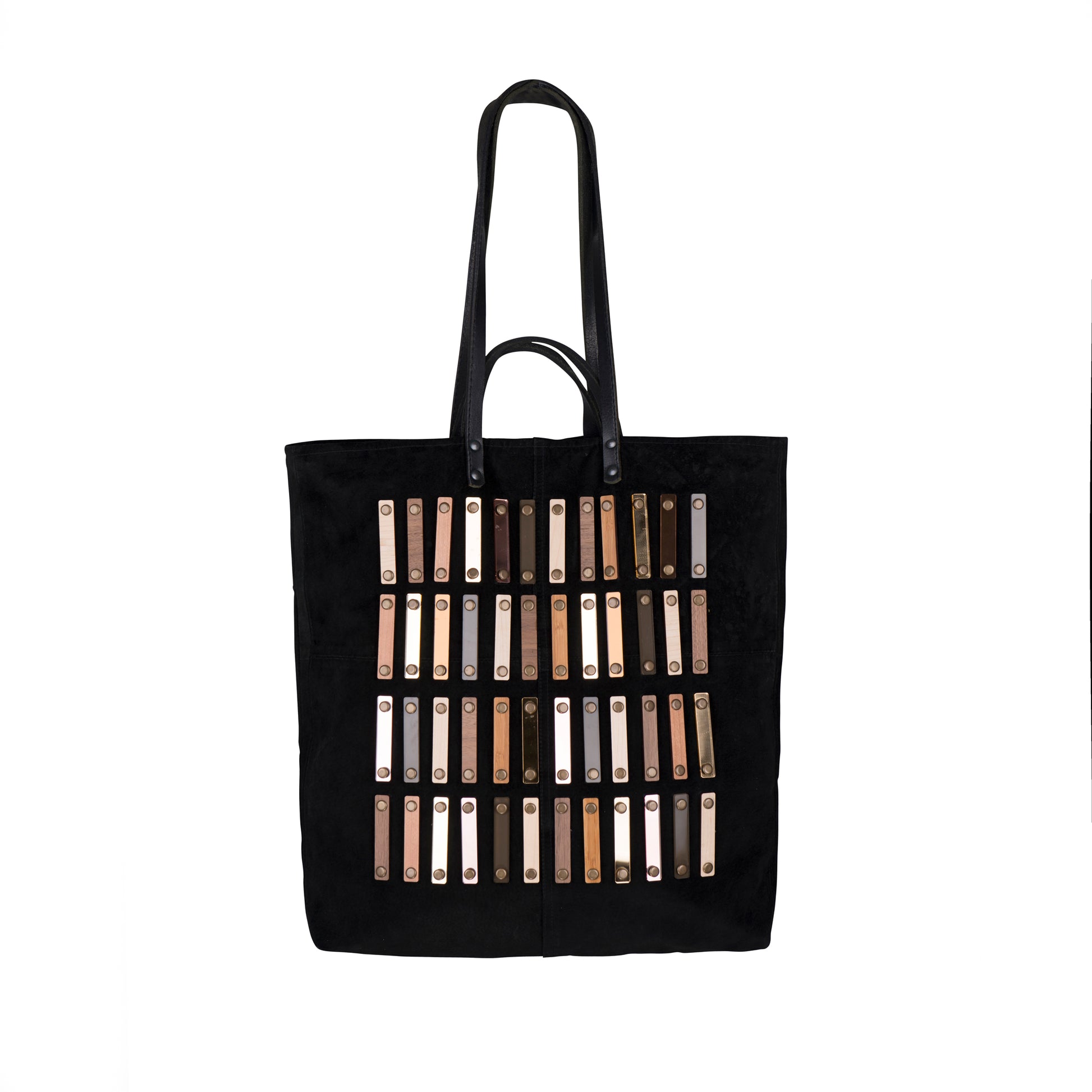 METANoIA black recycled leather tote handbag with acrylic and wooden vertical accents studded in a repeatitive fashion in an array of natural wooden browns, coppers and white.