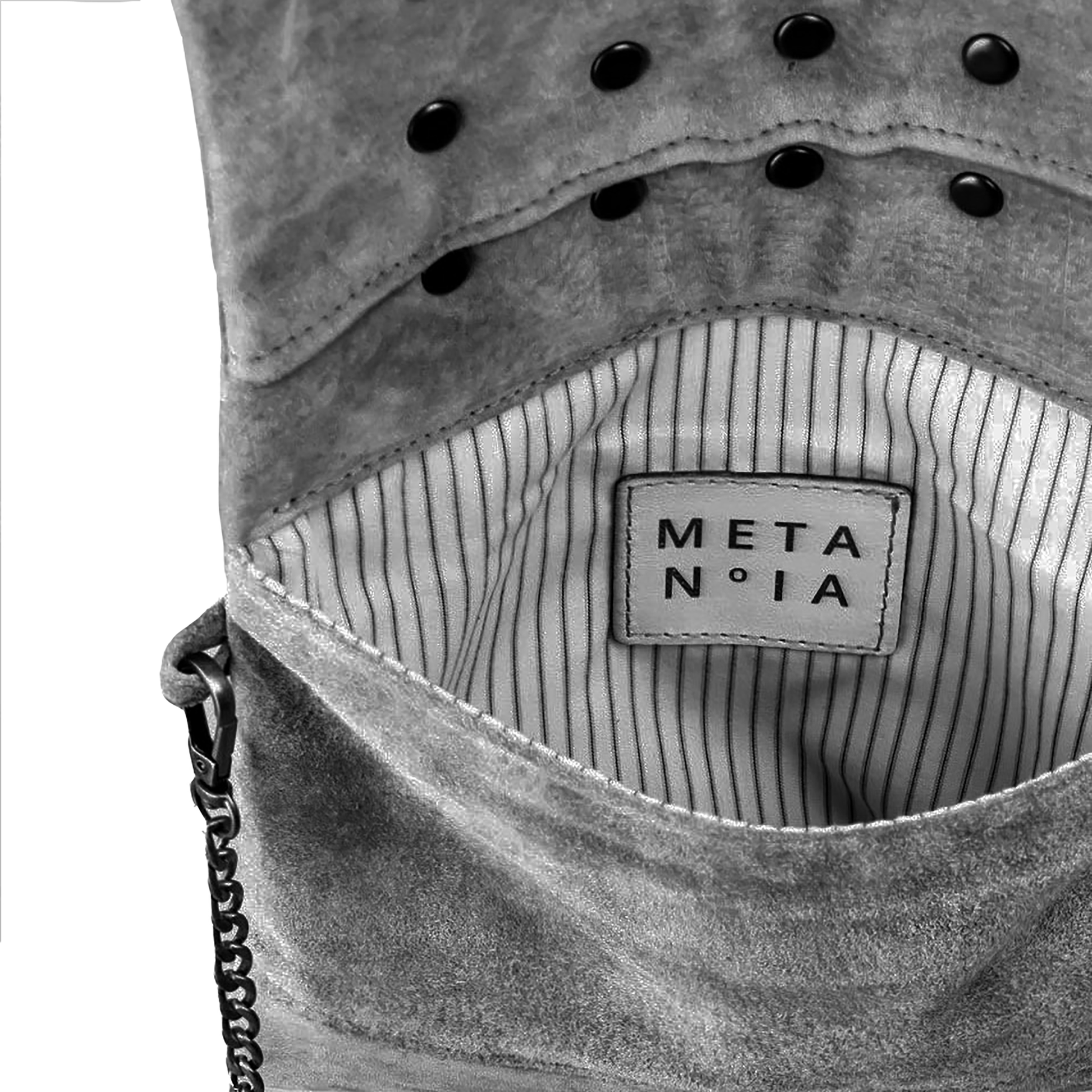 METANoIA The Disco Small Bag inside featuring pinstripe fabric sourced from recycled fabric and a caramel leather woven label lasered with the iconic METANoIA label.