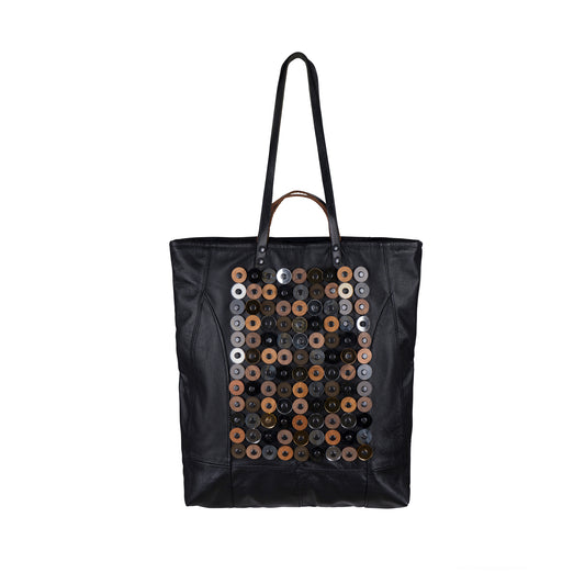 METANoIA black recycled leather tote handbag with  circle bamboo, walnut and acrylic forms fashioned into a repeative fashion with a smaller circle overlay on each form. 