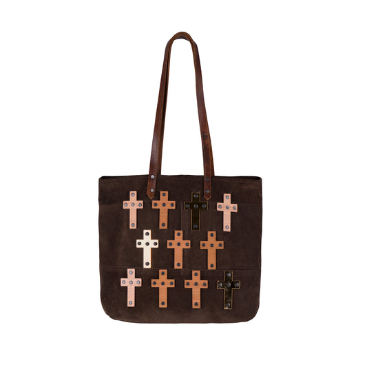 METANoIA The Cross Medium Bag inside featuring pinstripe fabric sourced from recycled fabric and a caramel leather woven label lasered with the iconic METANoIA label.METANoIA The Cross Chocolate recycled leather medium handbag with cross shaped bamboo, walnut and metallic acrylic forms.