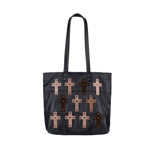 METANoIA The Cross Black recycled leather medium handbag with cross shaped bamboo, walnut and metallic acrylic forms.
