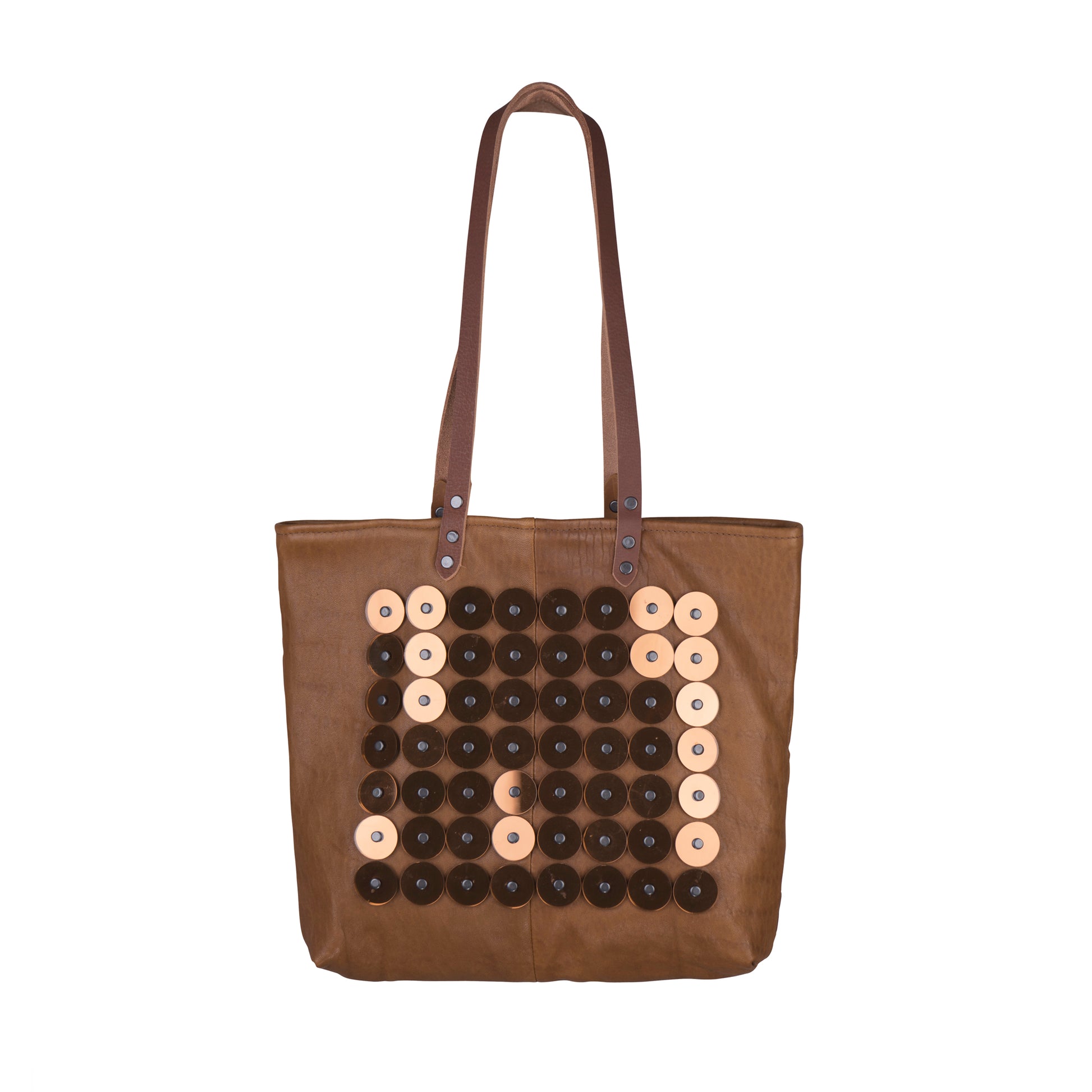 METANoIA tan recycled leather medium handbag with circle copper acrylic forms fashioned into a repetitive fashion with a smaller circle overlay on each form. 