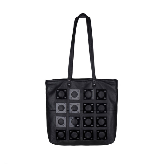 METANoIA black recycled leather medium handbag with square and hollowed circle black acrylic forms fashioned into a repeative fashion. 