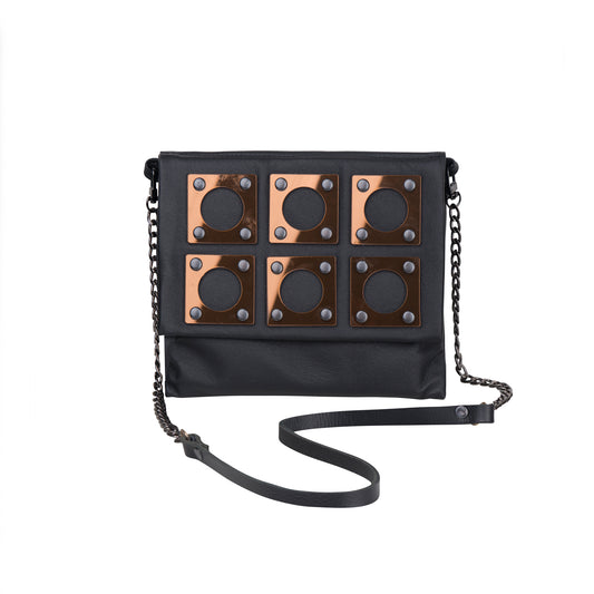 METANoIA black recycled leather small handbag with square and hollowed circle bronze acrylic forms fashioned into a repeative fashion. 